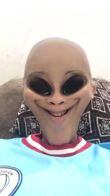 Preview for a Spotlight video that uses the Alien Face Lens