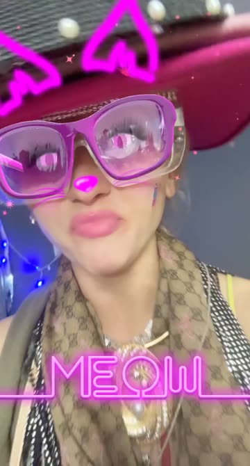 Preview for a Spotlight video that uses the Neon Meow Lens