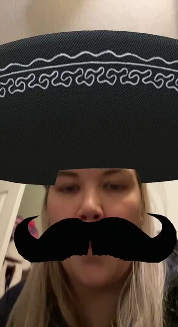 Preview for a Spotlight video that uses the SombreroAndStache Lens