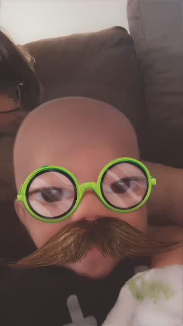 Preview for a Spotlight video that uses the Bald with glasses Lens