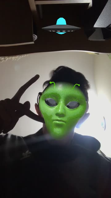 Preview for a Spotlight video that uses the UFO Green Alien Lens
