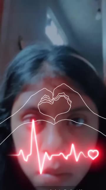Preview for a Spotlight video that uses the Neon Heart Beat Lens
