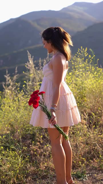 Sunset Serenity: A Woman's Graceful Dance in a Field of
