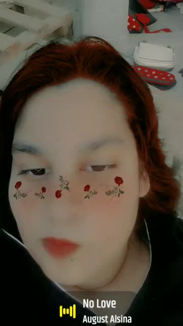 Preview for a Spotlight video that uses the Red Flowery Freckles Lens