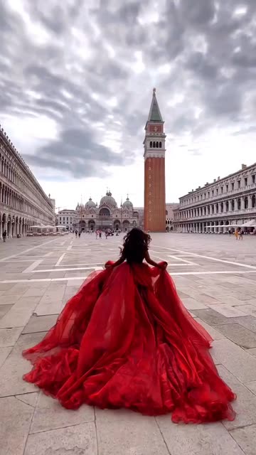 red dress photoshoot ideas Red Gown in Venice: A Fashion Statement in St. Mark's Square