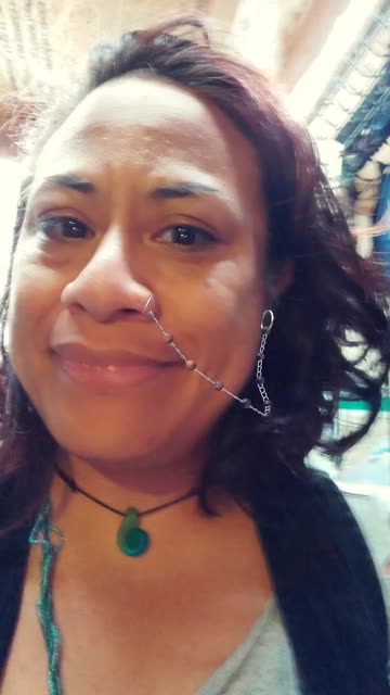 Preview for a Spotlight video that uses the Face Piercings Lens