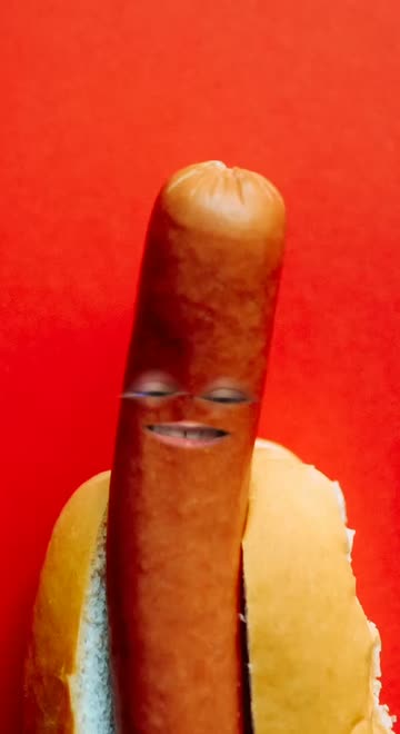 Preview for a Spotlight video that uses the Hotdog face Lens
