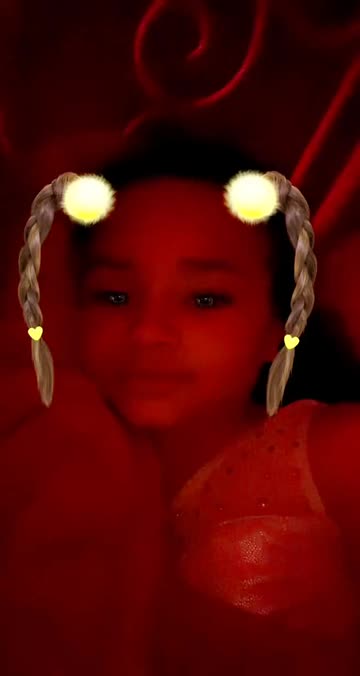 Preview for a Spotlight video that uses the Child with Pigtails Lens