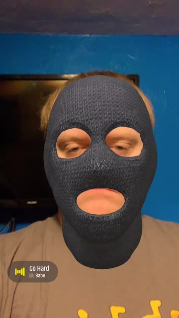 Preview for a Spotlight video that uses the Gangster Mask Lens