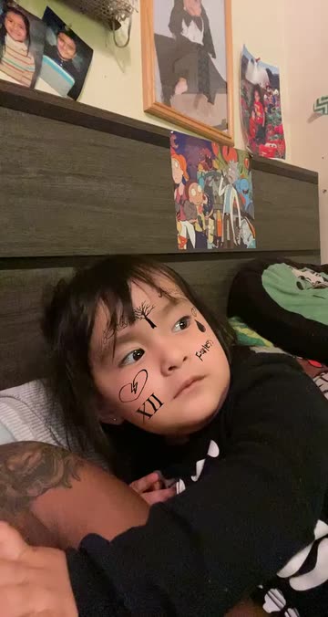 Preview for a Spotlight video that uses the Face Tattoos Lens