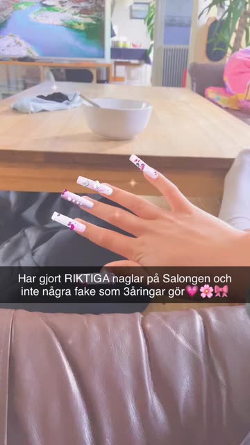Preview for a Spotlight video that uses the Kitty with Nails Lens