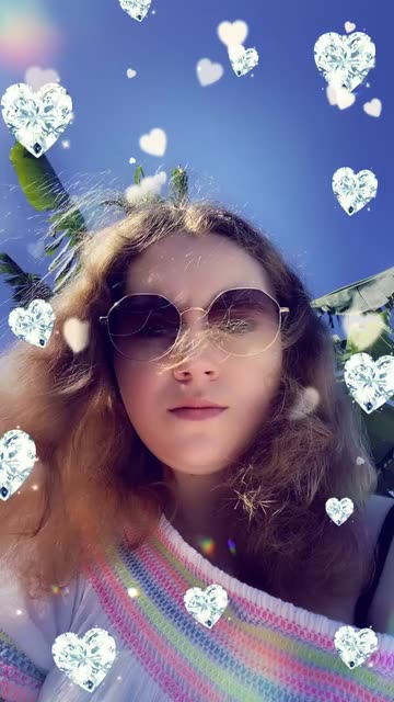 Preview for a Spotlight video that uses the Diamond Hearts  Lens