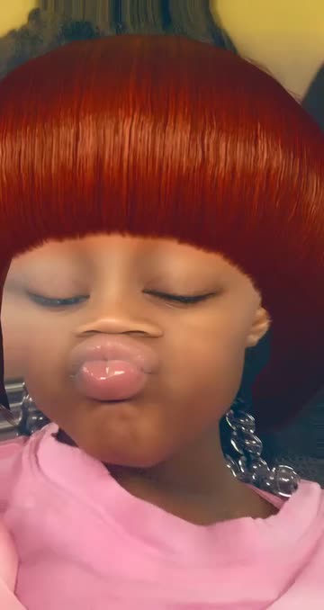 Preview for a Spotlight video that uses the Red Cartoon Hair Lens