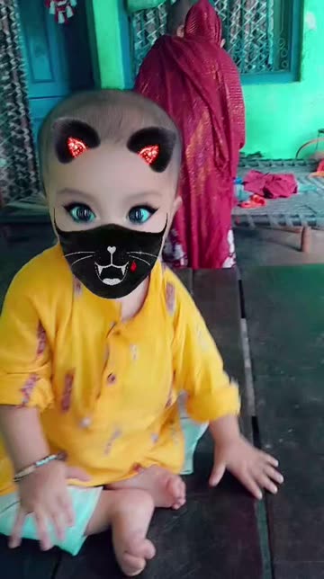 Preview for a Spotlight video that uses the Cat in Mask Lens