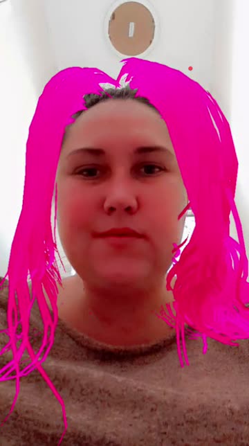 Preview for a Spotlight video that uses the Wig Try-On Lens