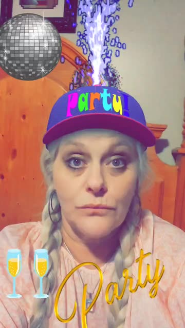 Preview for a Spotlight video that uses the Party Firework Hat Lens