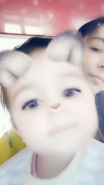 Preview for a Spotlight video that uses the Sparkle Cat Lens