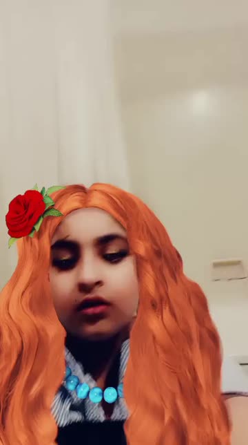 Preview for a Spotlight video that uses the Red Hairstyle Lens