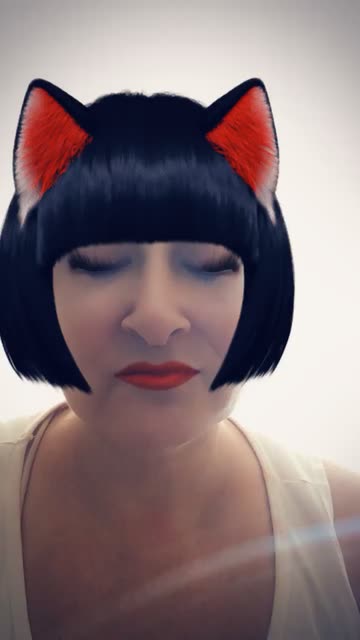 Preview for a Spotlight video that uses the Halloween Cat with Hair Lens