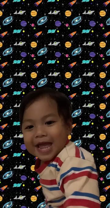 Preview for a Spotlight video that uses the solar system bg Lens