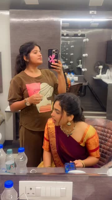 lady in indian dressing room Behind the Scenes with Navya Naidu: A Stylish Saree