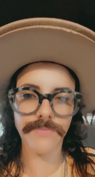 Preview for a Spotlight video that uses the Mustaches Lens