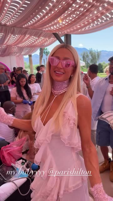 Lele Pons Shines at Paradise Party in White Ruffled Dress & Pink Sunglasses