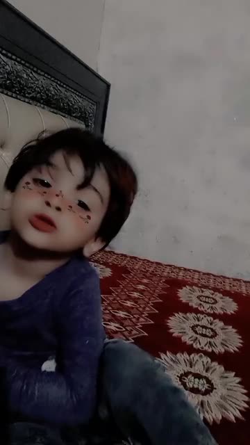 Preview for a Spotlight video that uses the Red Flowery Freckles Lens