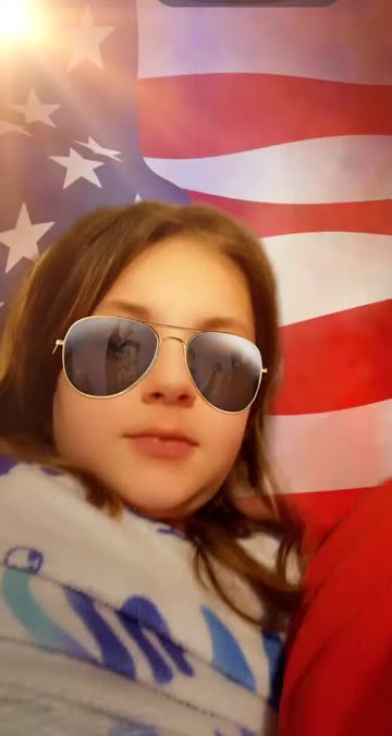 Preview for a Spotlight video that uses the Flag Background 🇺🇸  Lens