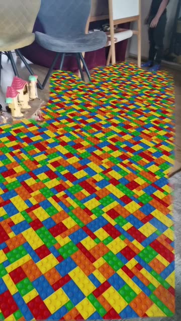 Preview for a Spotlight video that uses the THE FLOOR IS LEGO Lens