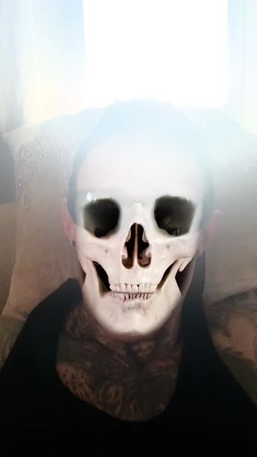 Preview for a Spotlight video that uses the Flaming Skull Lens