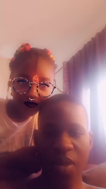 Preview for a Spotlight video that uses the Pink Hair and Glasses Lens