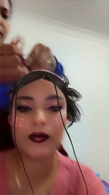 Preview for a Spotlight video that uses the Spiky Buns Hairstyle Lens
