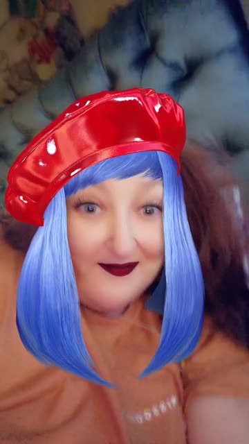 Preview for a Spotlight video that uses the Blue Hair Red Beret Lens