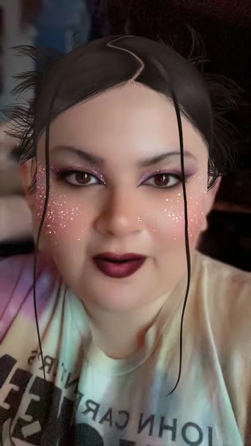 Preview for a Spotlight video that uses the Spiky Buns Hairstyle Lens