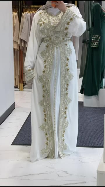 lebanese traditional dress The Tantour Was Extraordinary Read full article: https://learndabke.co/2026/05/17/lebanese-traditional-costume-sherwal-tantour-gumbaz-hatta/ If the sherwal is the most recognized costume, the tantour is one of the most extraordinary forms in Raveena's Vibrant Traditional Outfit Showcase