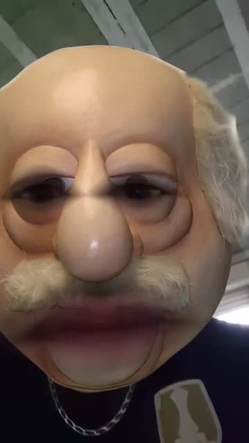 Preview for a Spotlight video that uses the Grandpa Cartoon Lens