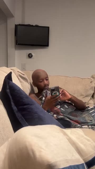 Preview for a Spotlight video that uses the Bald Baby Mustache Lens