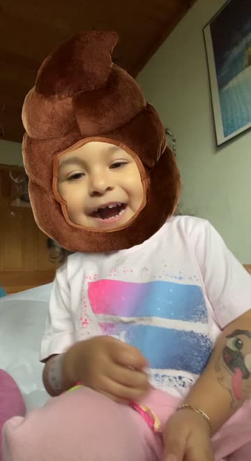 Preview for a Spotlight video that uses the Poop Face Lens