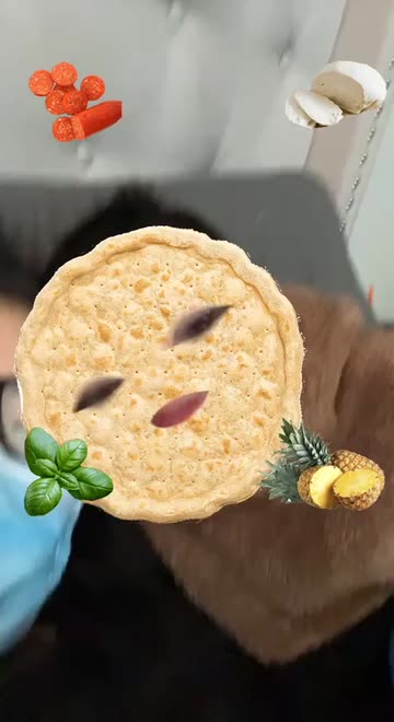 Preview for a Spotlight video that uses the pizza face maker Lens