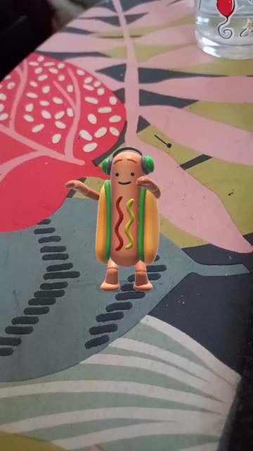 Preview for a Spotlight video that uses the Dancing Hot dogðŸŒ­ Lens