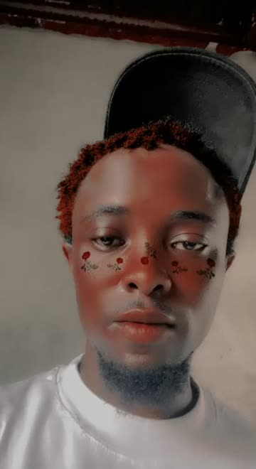 Preview for a Spotlight video that uses the Red Flowery Freckles Lens