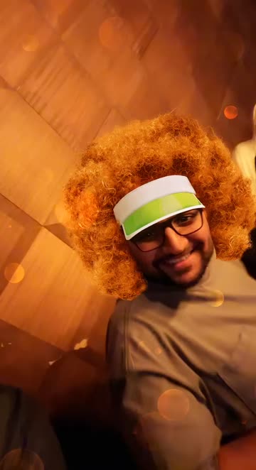 Preview for a Spotlight video that uses the Curly Perm Lens