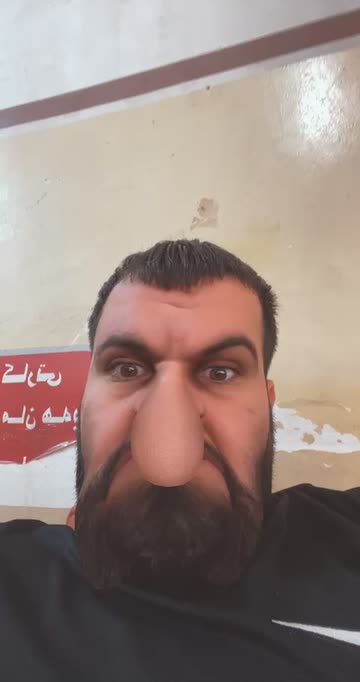 Preview for a Spotlight video that uses the Unhappy Face Lens