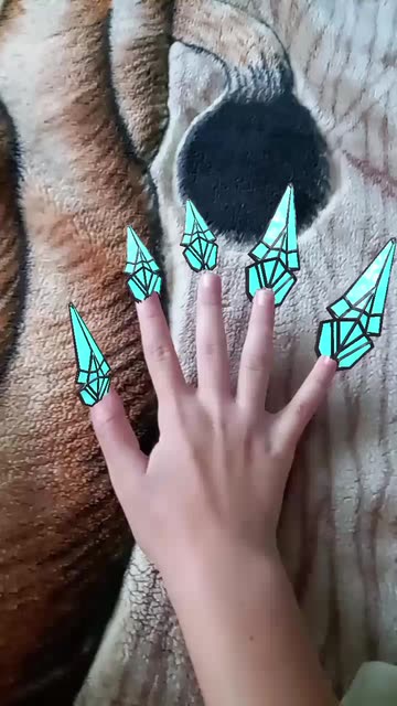 Preview for a Spotlight video that uses the Crystal Nails Lens