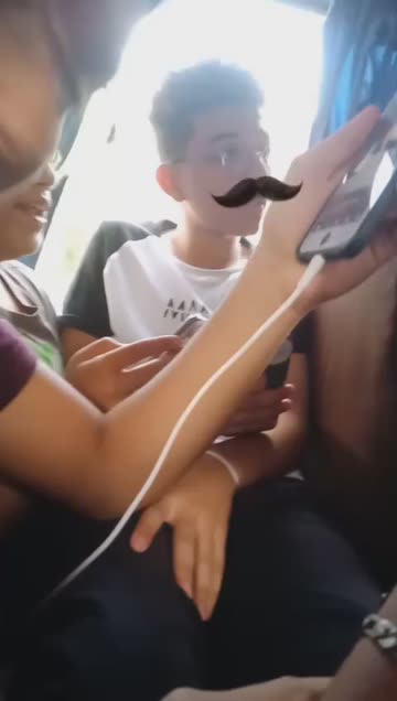 Preview for a Spotlight video that uses the Mustache Lens