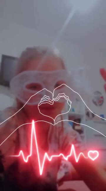 Preview for a Spotlight video that uses the Neon Heart Beat Lens