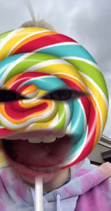 Preview for a Spotlight video that uses the lollipop face Lens